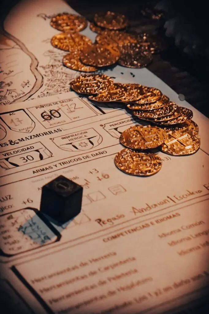 Ficha de personaje de rol con monedas de oro y un dado de seis caras
